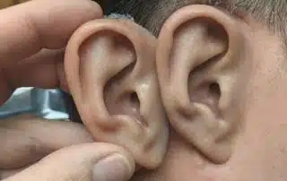 A man with two ears touching each other.