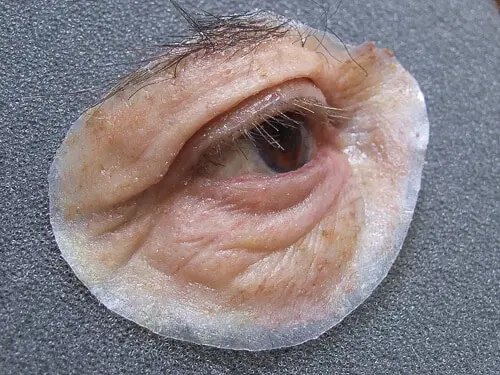 A close up of an eye with wrinkles